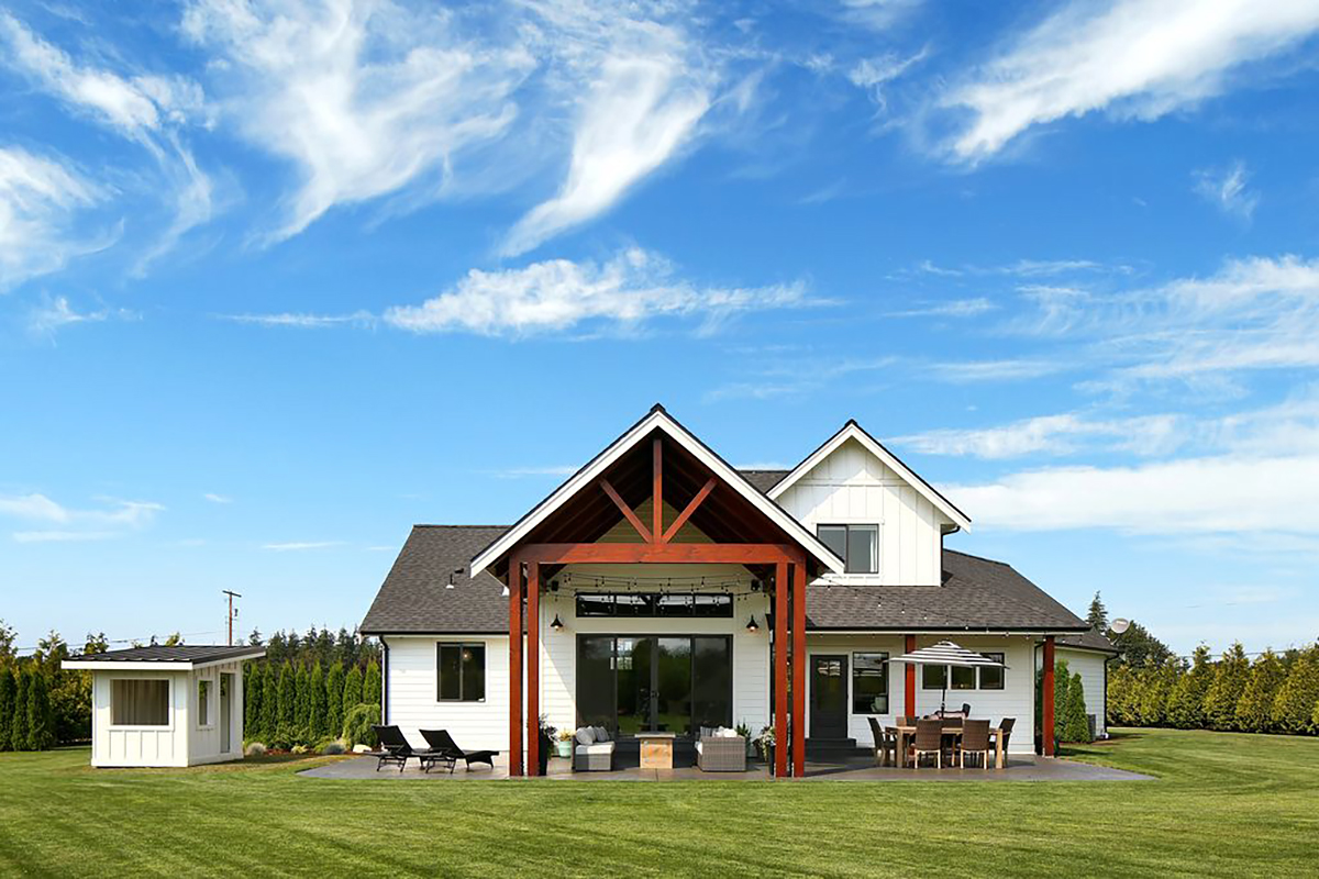 Country, Farmhouse Plan with 2878 Sq. Ft., 3 Bedrooms, 3 Bathrooms, 2 Car Garage Rear Elevation