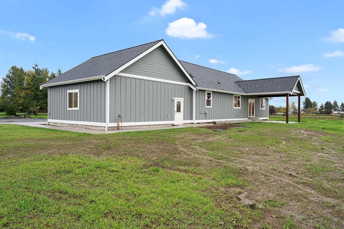 Country, Farmhouse, Ranch Plan with 2468 Sq. Ft., 3 Bedrooms, 2 Bathrooms, 2 Car Garage Picture 2