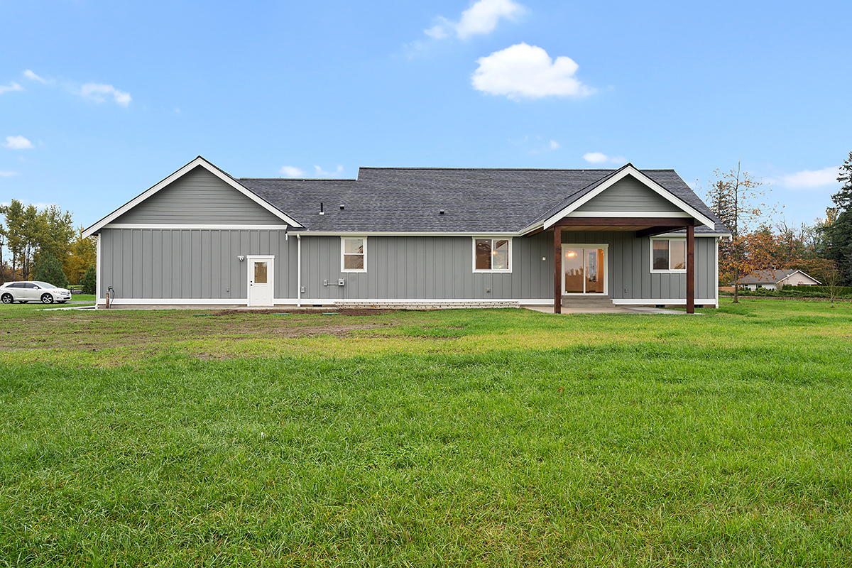 Country, Farmhouse, Ranch Plan with 2468 Sq. Ft., 3 Bedrooms, 2 Bathrooms, 2 Car Garage Rear Elevation