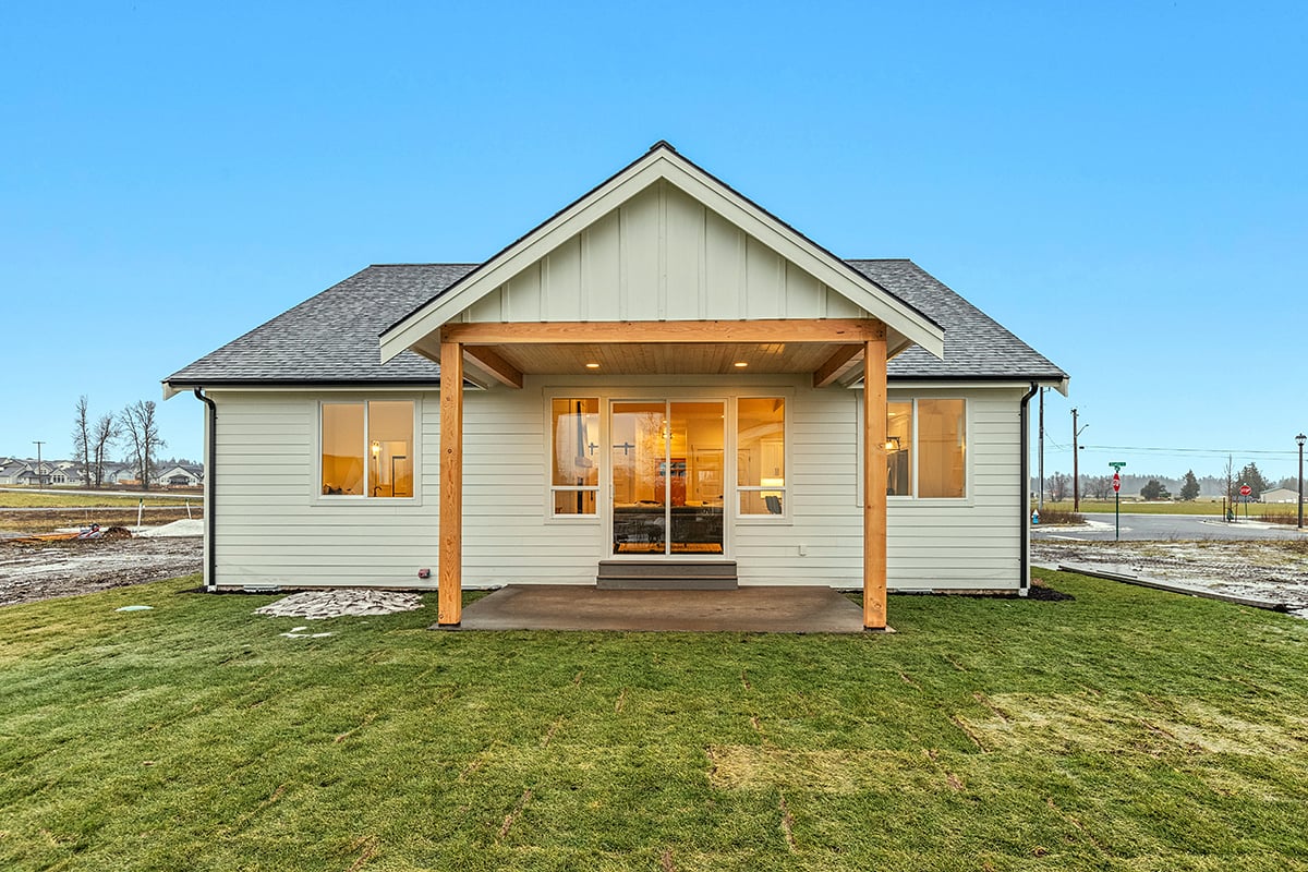 Craftsman, Farmhouse, Ranch Plan with 1497 Sq. Ft., 3 Bedrooms, 2 Bathrooms, 2 Car Garage Rear Elevation