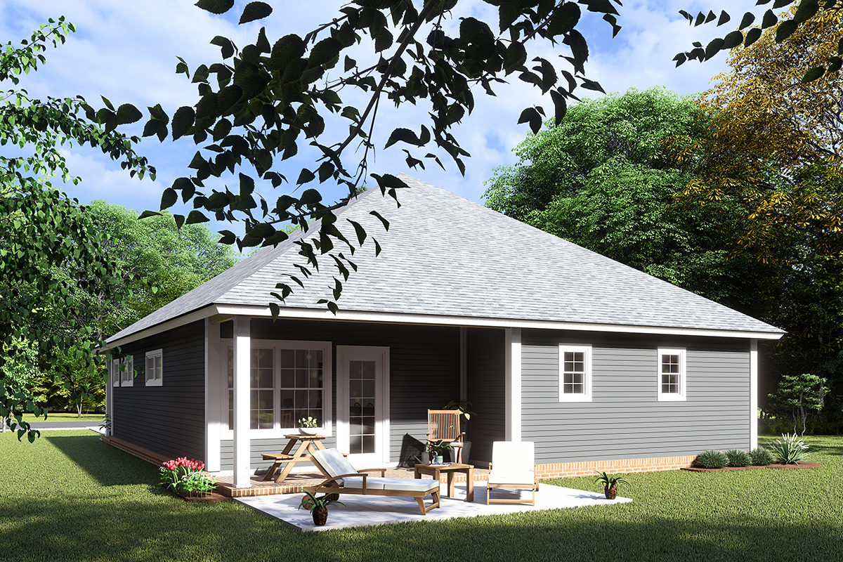Traditional Plan with 1545 Sq. Ft., 3 Bedrooms, 2 Bathrooms, 2 Car Garage Rear Elevation