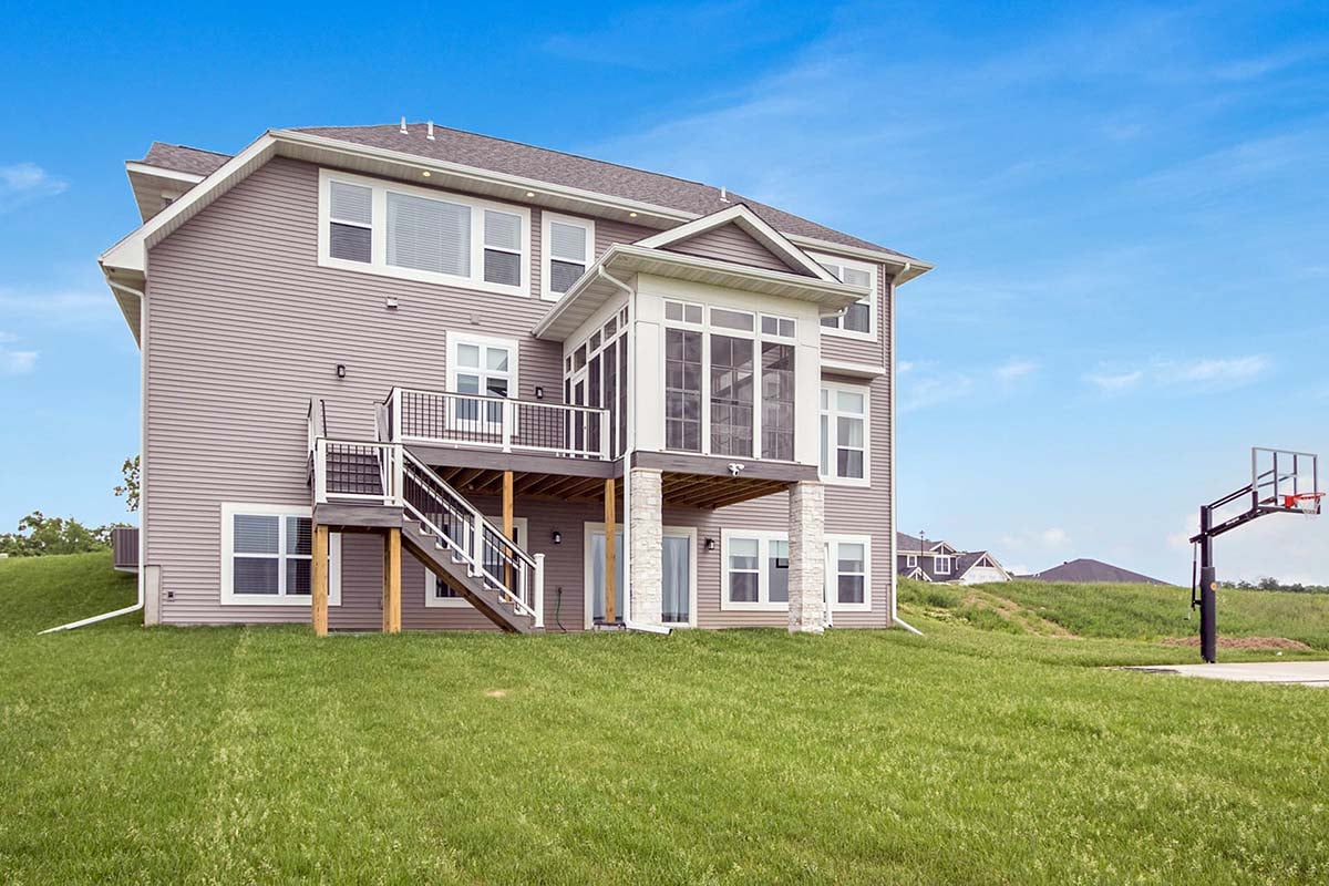 Craftsman, Ranch Plan with 4388 Sq. Ft., 6 Bedrooms, 5 Bathrooms, 3 Car Garage Rear Elevation