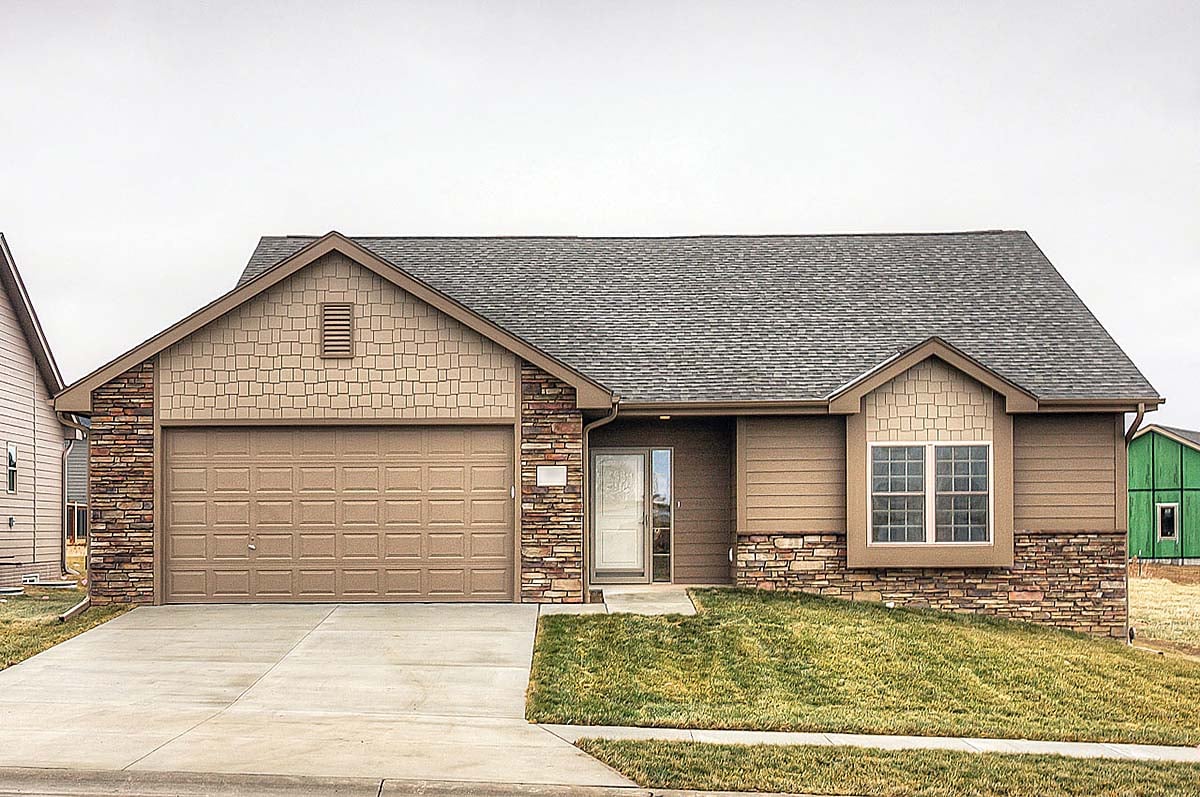 Traditional Plan with 1426 Sq. Ft., 3 Bedrooms, 3 Bathrooms, 2 Car Garage Elevation
